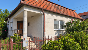 Dom s pozemkom 1500 m² a dvomi bytovými jednotkami mi v Iži - fotografia 12