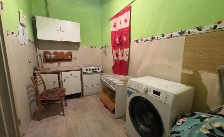 Dom s pozemkom 1500 m² a dvomi bytovými jednotkami mi v Iži - fotografia 10